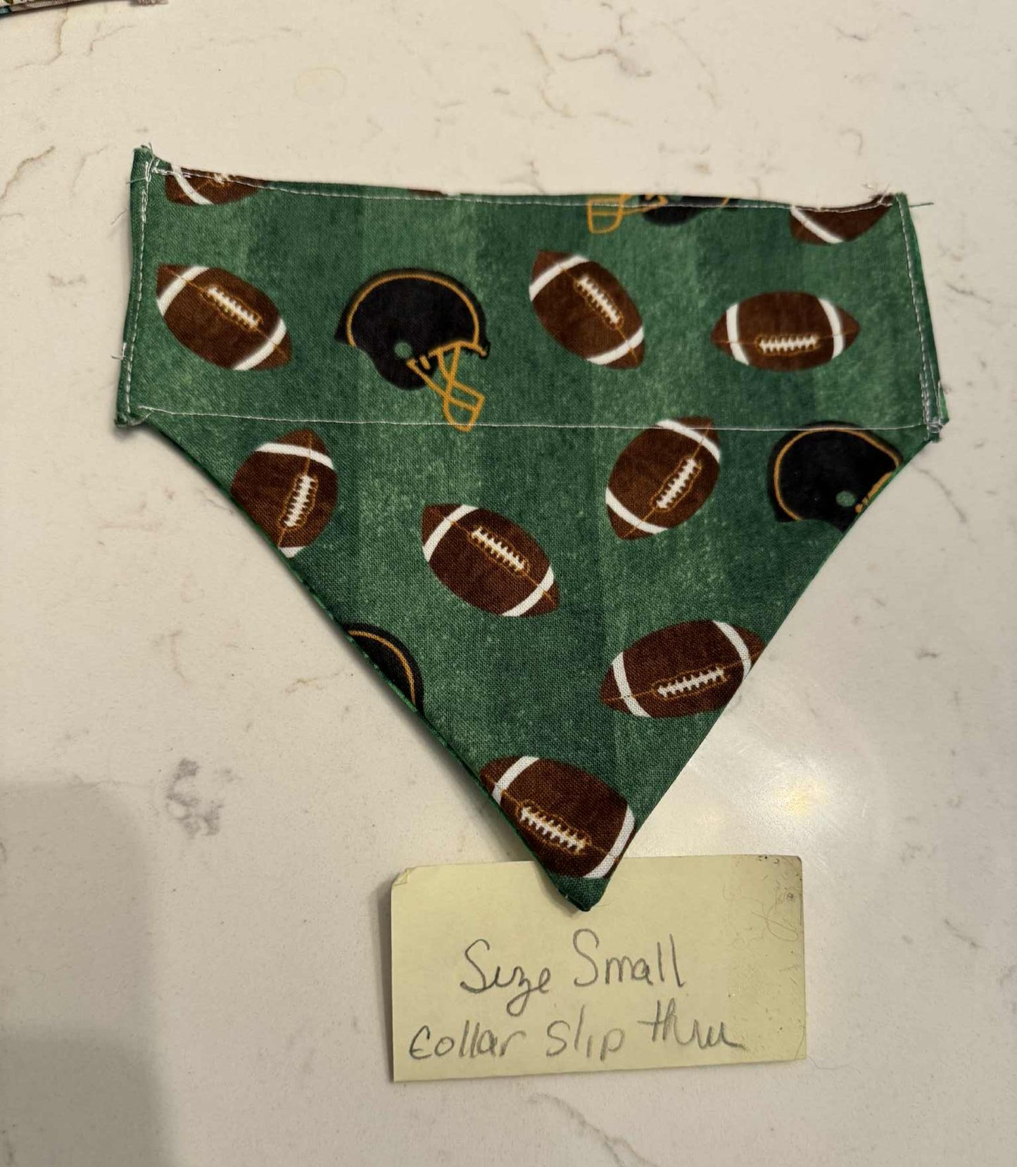 Football and Green over the collar