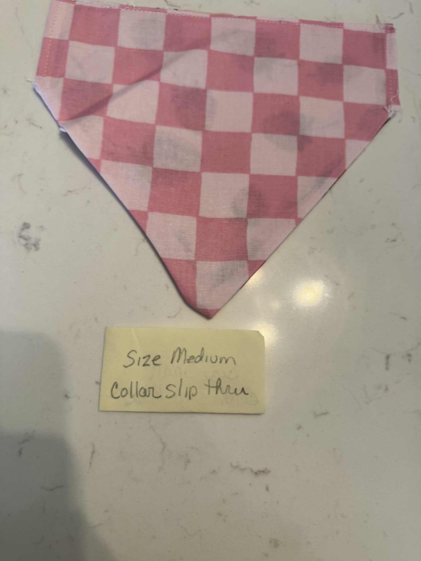 Pink checkered and  Strawberry over the collar